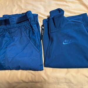 Nike Women’s Half-Zip Sweater and track jogger set.

Top size M
Bottom L